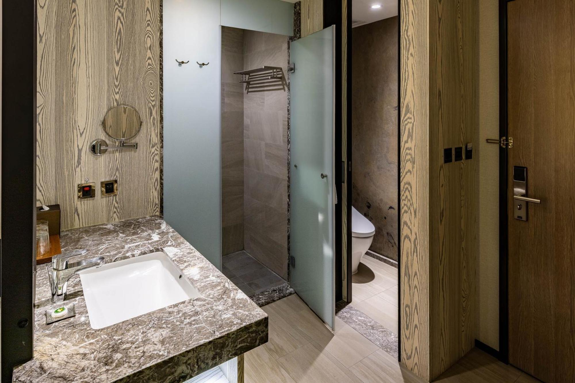 Hsin Hotel Chiayi Zimmer foto Bathroom