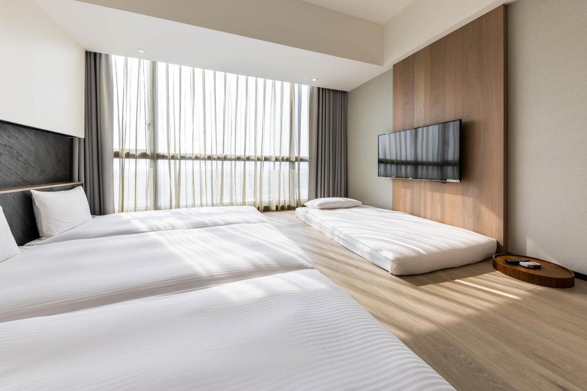 Hsin Hotel Chiayi Zimmer foto Deluxe Room