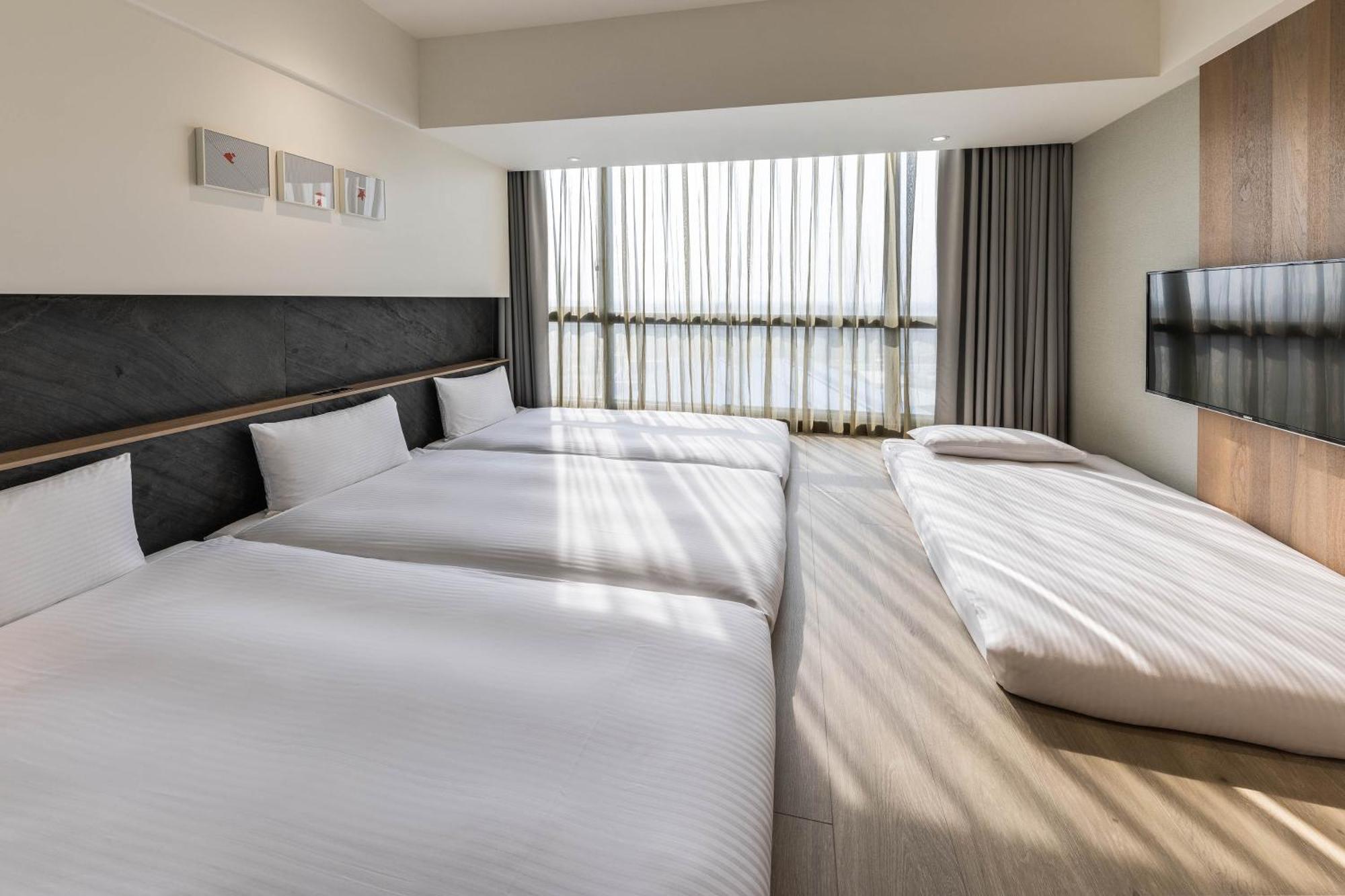 Hsin Hotel Chiayi Zimmer foto A room at the hotel