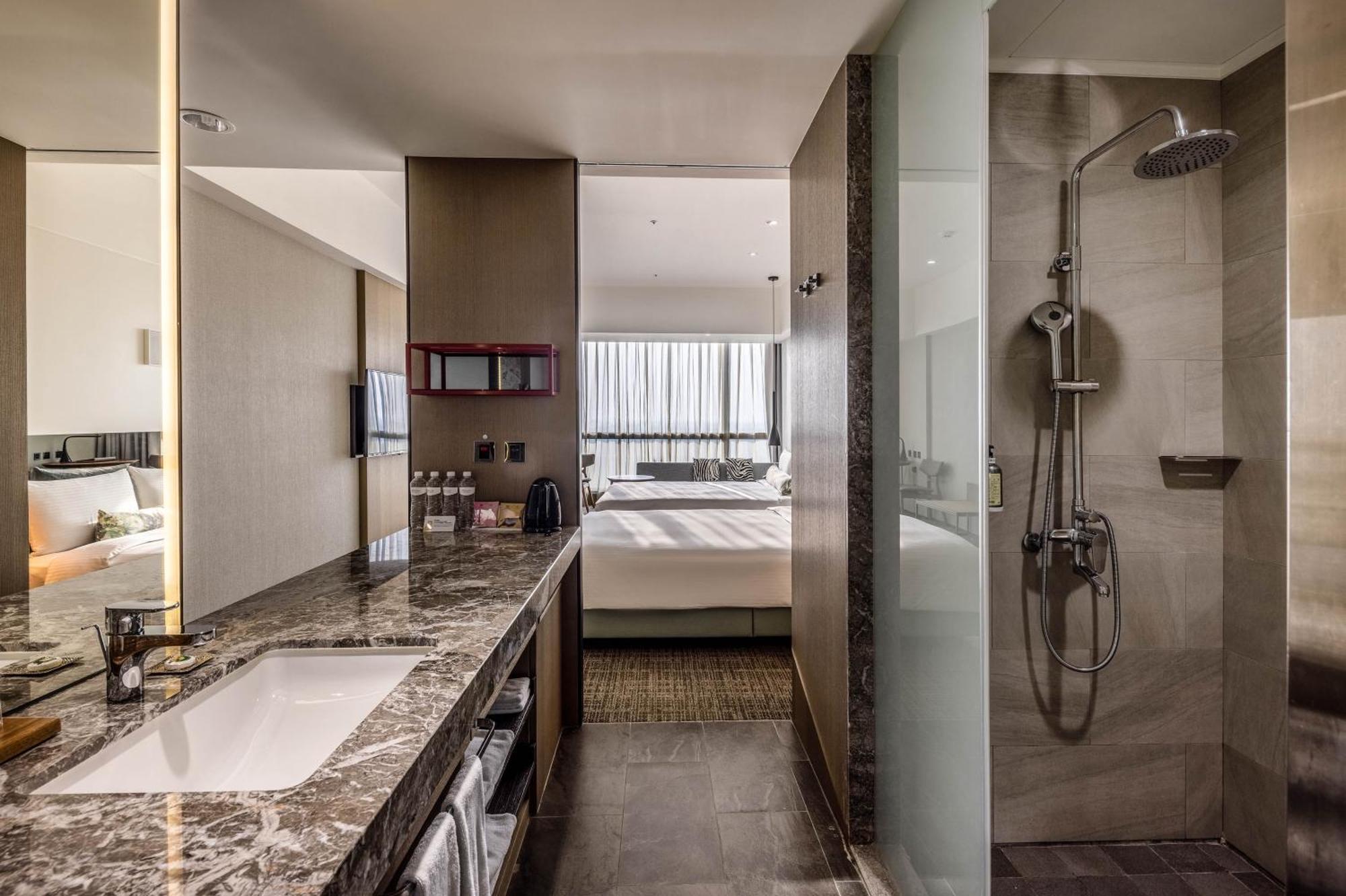 Hsin Hotel Chiayi Zimmer foto A bathroom at the hotel
